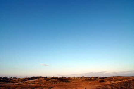 Dunes and blue sky in Bretignolles, Franceの写真素材