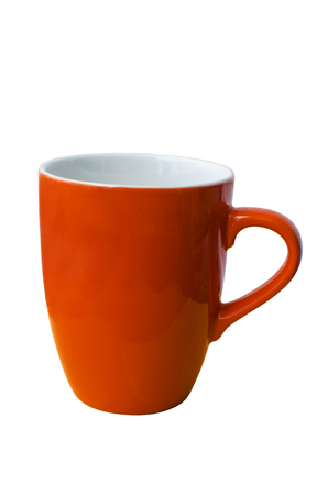 Empty coffee mug , orange ceramic coffee cup isolated on white background with clipping pathの写真素材