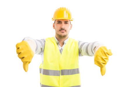 Constructor builder or engineer showing thumbs down gesture as refusal denial rejection disapproval...