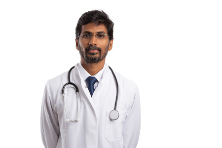 Portrait picture of indian doctor wearing medical coat isolated on white backgroundの写真素材