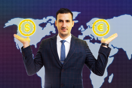 Man working at business stock market holding euro and dollar symbols in palms as economical balance concept with blue world map backgroundの写真素材