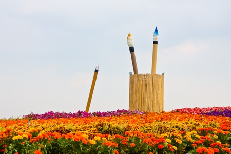 Big paintbrust in flower fieldの写真素材