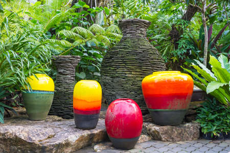 Colorful fountain jar in the gardenの写真素材
