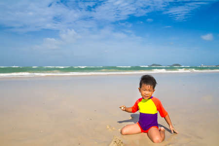 Asian boy on the beachの写真素材