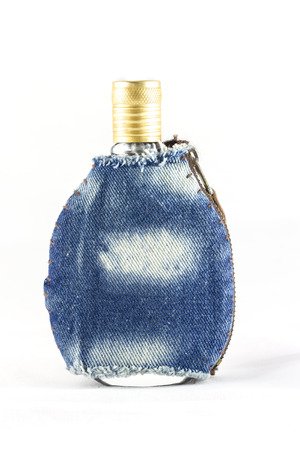 Perfume bottle in the cloth bagの写真素材