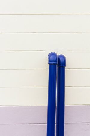 Blue chemical industrial pipe on the wallの写真素材