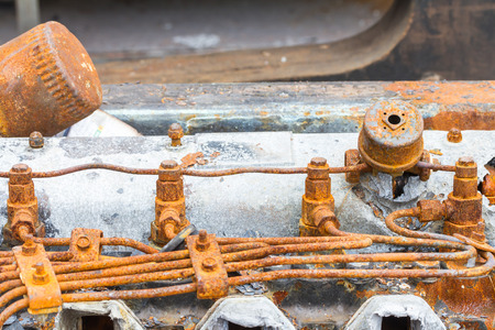 Old rusty injector and fuel pipe of diesel engine