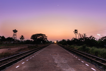 Train moving to the station in sunset, Thailandの写真素材