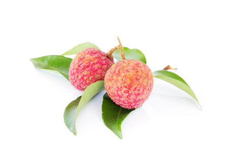 lychees with leaves on white backgroundの写真素材