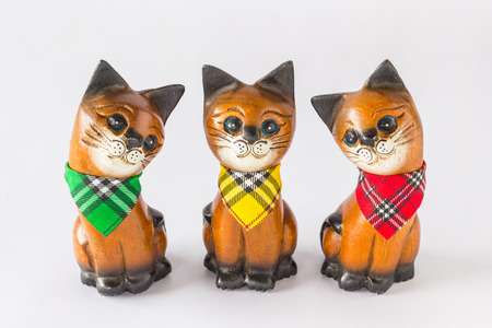 three wood cat on white isolate backgroundの写真素材