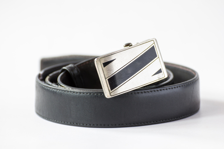 leather belts on white isolateの写真素材