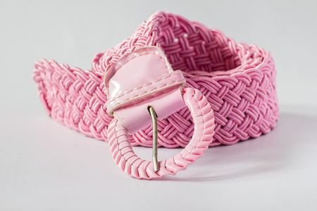 leather belts on white isolateの写真素材