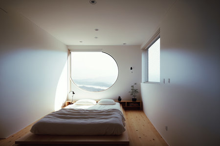 Japanese minimalist bedroom design Modern room with white walls and a hardwood floorの素材