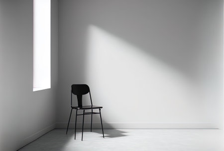 A chair is in the room with a blank white wall backgroundの素材