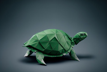 Origami turtle made of green paper, isolated on a gray backdropの素材