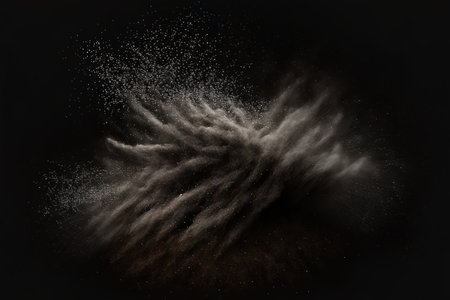 Flying dust particles on a black backgroundの素材