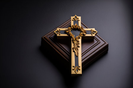 wooden crucifix at a funeral concept on a black backdrop, top view, copy spaceの素材