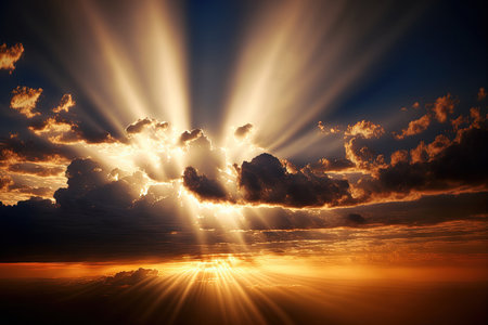 Sunrays at sunset, sun and clouds in the skyの素材