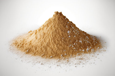 White background with a pile of dry beach sandの素材