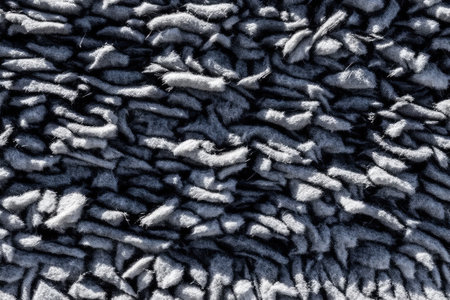 Grey carpet with long pile abstract texture background in close up (high details)の素材