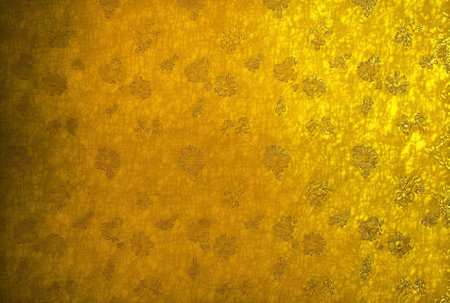 Background of a yellow flowery wall textureの素材