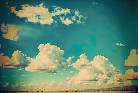 Vintage style backdrop of a blue skyの素材