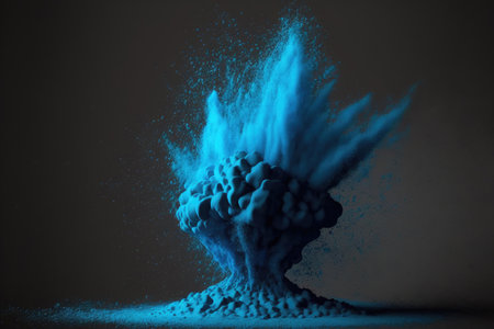 Blue dust eruption in slow motion over a dark backgroundの素材