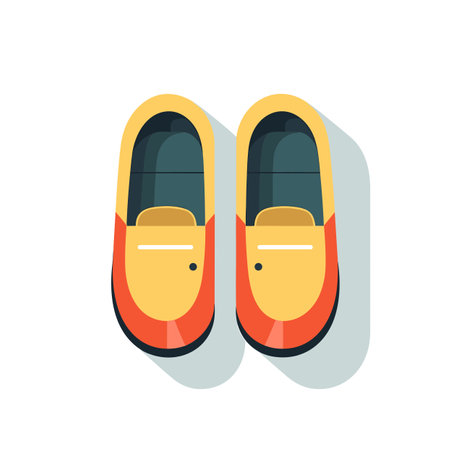 Vector of a pair of orange shoes with a white backgroundの素材