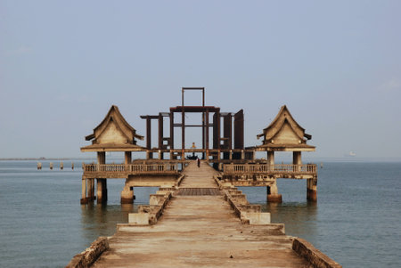 Waterfront pavilion, ruin of temple at Pattaya beach Thailand
