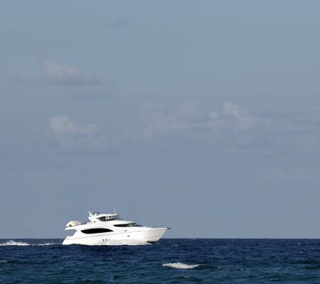 A cruising boat on the oceanの写真素材