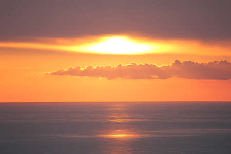 Sun through cloudsの写真素材