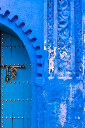 Detail of a door in the town of Chefchaouen, in Moroccoの写真素材