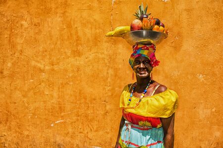 Cartagena de Indias, Colombia - February 23, 2014: Colombian woman wearing traditional clothes in Cartegena de Indias, in Colombia.のeditorial素材