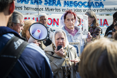 Buenos Aires, Argentina - October 3, 2013: People Gathered in a demonstration of the Mothers of the Plaza de Mayo ( "AsociaciÃ³n Madres de Plaza de Mayo") in the Plaza de Mayo in Buenos Aires, Argentina.のeditorial素材