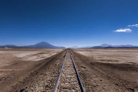 Train tracks in the desert in the Potosi Region in Bolivia, South America; Concept for travel in Bolivia and the Andesの写真素材
