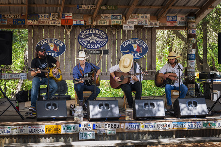 Luckenbach, Texas, USA - June 8, 2014: Country music band playing in a music venue in Luckenback, Texas.のeditorial素材