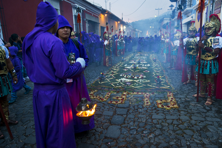 Antigua, Guatemala - April 17, 2014: Man wearing ancient Roman military clothes and purple robes in a procession during the Easter celebrations, in the Holy Week, in Antigua, Guatemala.のeditorial素材