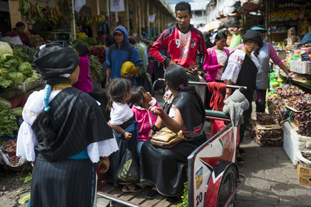 Otavalo, Ecuador - February 1, 2014: People in a market  the town of Otavalo in Ecuador.のeditorial素材