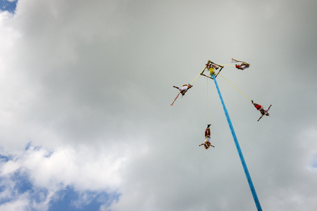 El Tajin, Mexico - May 21, 2014: Man performing the Dance of the Flyers (Danza de Los Voladores) in the El Tajin, Mexico.のeditorial素材