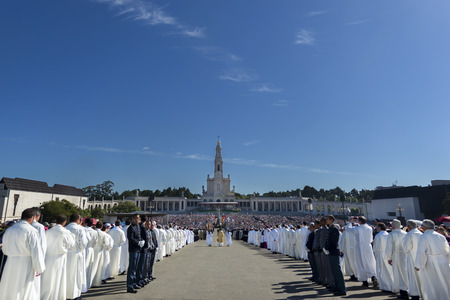 Fatima, Portugal - May 13, 2014: Crowd of people at the Sanctuary of Fatima during the celebrations of the apparition of the Virgin Mary in Fatima, Portugal.のeditorial素材