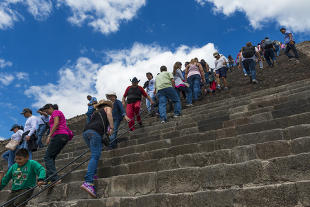 Teotihuacan, State of Mexico, Mexico - June 1, 2014: Visitors in the Temple of the Sun staircase at the Teotihuacan archaeological site in Mexico. Teotihuacan was one of the largest cities in the pre-Columbian Americas.のeditorial素材