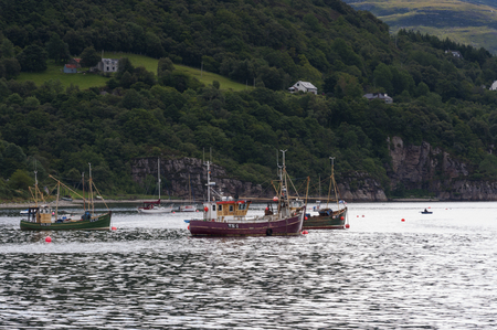 Ullapool, Scotland - August 15, 2010: Fishing boats in the port of Ullapool in the Highlands in Scotland, United Kingdomのeditorial素材