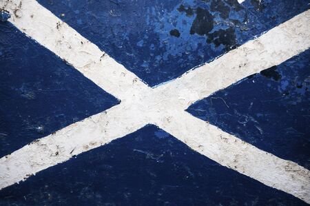 The Flag of Scotland painted in the hull of a ship; Concept for travel in Scotlandの写真素材