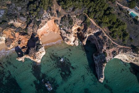 Aerial view of the coastline in the Praia do Alemao in Portimao, Algarve, Portugal. Concept for travel in Portugal and Algarveの写真素材