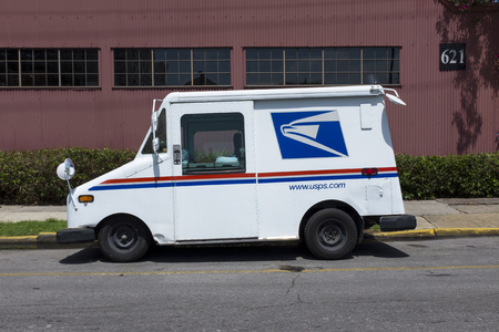 New Orleans, Louisiana - June 17, 2014: United States Postal Service (USPS) truck parked in a street of the city of New Orleans in Louisiana, USA.のeditorial素材