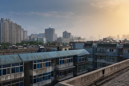 Xian, China - August 6, 2012: View of the city of Xian at sunset, with residential buildings, in China, Asiaのeditorial素材
