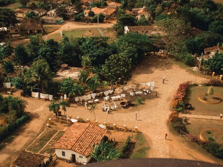 Beautiful small green village from above. Old Manaca Iznaga Tower. slavery near Trinidad, Cuba and tourists in Cienfuegos, Cubaの写真素材
