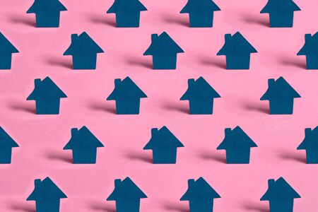 set of homes on pink isolated background, real estate concept. Acquisition of a home in neighborhood.の写真素材