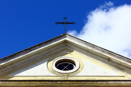 Detail of an old church and the crossの写真素材