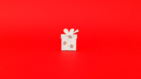 Red gift with a red backgroundの写真素材
